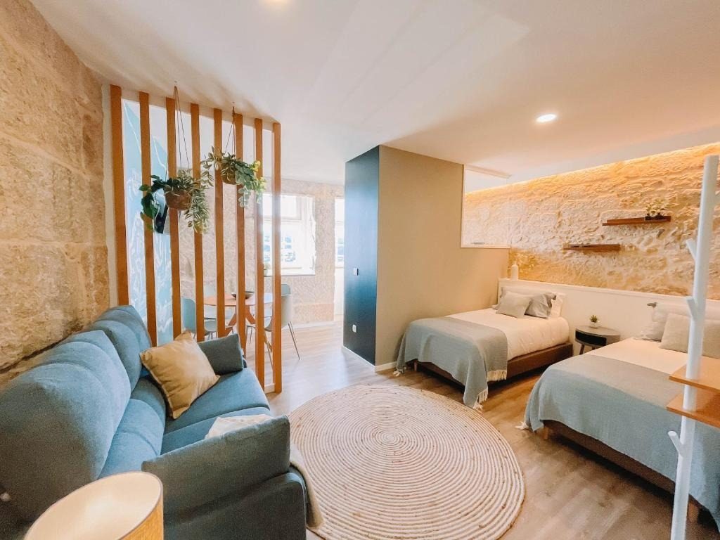 Interior da Suíte do Meio, com sofá e camas individuais